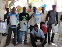 Pastor Pierre Banes Laurore, the Kids' EE Haiti Director seen here in YWAM in Gonaive documenting the Sawyer PointONE water filter distribution.