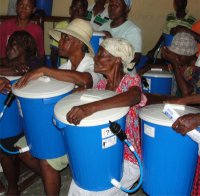 Seen here some of the residence of Cite Soleil receiving their filters immediately after the earthquake.l