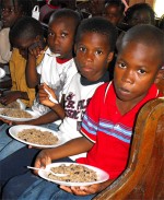 Haiti Church of God feeding the children at the Kids EE Training Summer Camp