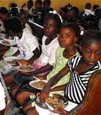 Haiti Church of God feeding the children at the Kids EE Training Summer Camp
