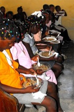 Haiti Church of God feeding the children at the Kids EE Training Summer Camp