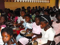 Haiti Church of God feeding the children at the Kids EE Training Summer Camp