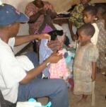 Malawi children receiving their Christmas gifts compliments of United Caribbean Trust working in association with Restoration Ministries International