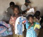Malawi children receiving their Christmas gifts compliments of United Caribbean Trust working in association with Restoration Ministries International