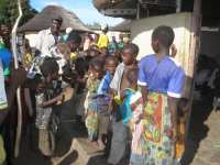 Malawi children receiving their Christmas gifts compliments of United Caribbean Trust working in association with Restoration Ministries International