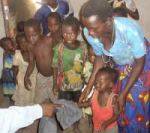 Malawi children receiving their Christmas gifts compliments of United Caribbean Trust working in association with Restoration Ministries International