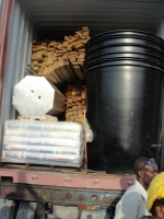 400 gal drums arriving in Haiti for the Moringa pilot project in Les Cayes