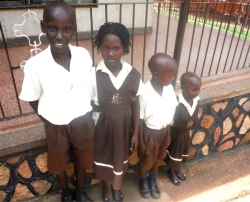 Stuart seen here on the left on his first day at school - praise God.