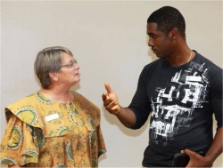 Shane Forrester  seen here at the LLoyd Erskin Sanderford Centre with Jenny Tryhane the founder of United Caribbean Trust 