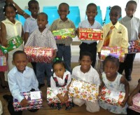 Abundant Life Assembly Sunday School with shoe boxes packed for the children of Haiti. 