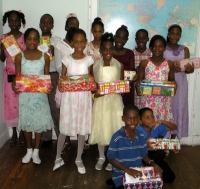 Abundant Life Assembly Sunday School with shoe boxes packed for the children of Haiti.