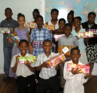 Abundant Life Assembly Sunday School with shoe boxes packed for the children of Haiti.