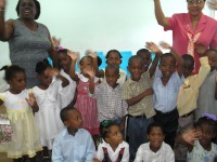 Abundant Life Assembly Sunday School with shoe boxes packed for the children of Haiti.