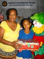 Mama Yol, the founder of the Yolanda Thervil Foundation seen here with Annie the clown who travelled all the way from Barbados