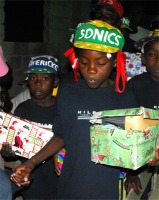 Children with the Make Jesus Smile shoeboxes