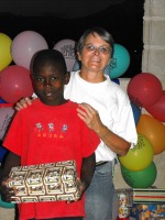 Jenny Tryhane distributing the Make Jesus Smile shoeboxes