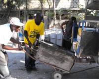 Seen here taking delivery of the BioSand Water Filter mould that will be used in the Bon Repos Clean Water for Haiti production plant. 