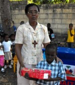 Seen here with Rev Maud Hyppolite at the Methodist school in Carrinage, Petit Gouve. 