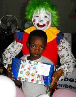 Annie the clown distributing Make Jesus Smile shoeboxes