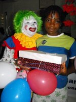 Annie the clown distributing Make Jesus Smile shoeboxes