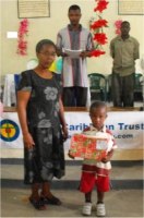 Seen here with Rev Maud Hyppolite at the Methodist church in Oliviere. 