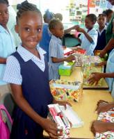 Half Moon Primary School children packing  shoe boxes for the children in Haiti