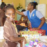 Barbados school packing shoeboxes in the Make Jesus Smile programme 