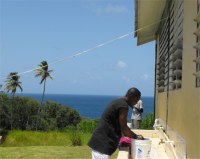 Outside the kitchen is the laundry area 