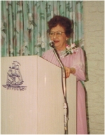 Lucille addressing the ladies