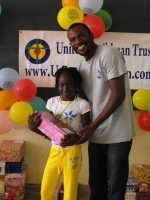 mran  Richards distributing the Make Jesus Smile shoeboxes in Brokoponda