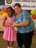 Kim Smith distributing the Make Jesus Smile shoeboxes in Brokoponda