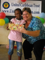 Kim Smith distributing the Make Jesus Smile shoeboxes in Brokoponda