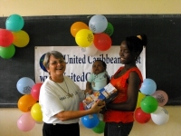Jenny Tryhane in Suriname distributing the Make Jesus Smile shoeboxes in Brokoponda