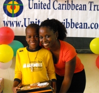 Kathy Ann Sanderford  distributing the Make Jesus Smile shoeboxes in Brokoponda