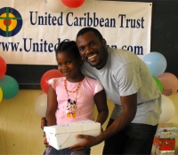 mran  Richards distributing the Make Jesus Smile shoeboxes in Brokoponda