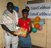 The host pastor in Tjaikondre helping with the distribution.