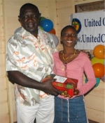 The host pastor in Tjaikondre helping with the distribution.