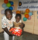 The host pastor in Tjaikondre helping with the distribution.