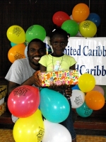 Imran Richards representing the Wesleyan Holiness church in Barbados seen here distributing the Make Jesus Smile shoeboxes.