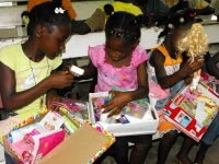 United Caribbean Trust Make Jesus Smile shoebox project was taken into Victoria to bless the Maroon children 