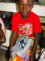 Imran Richards representing the Wesleyan Holiness church in Barbados seen here distributing the Make Jesus Smile shoeboxes.