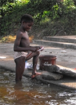 On arrival at Tjaikondre there is always a hive of activity with little scantly clad children fishing and helping their mothers with the washing or diving off the round smooth rocks and generally enjoying the cool water of river-side life.