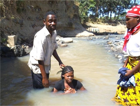 House of Prayer and Freedom Church Tanzania baptising new members