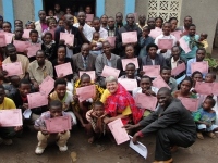 Pastor Maiko Msyani seen here front right in a suit next to Jenny in her Massai wrap a gift from the group.