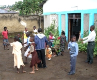 Teacher Nicodemus Kasumba has been a great help to Pastor David and you can see him here outside of House of Freedom, Mbeya with the children of the PowerClub.