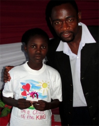 Seen here the children from House of Freedom Tanzania receiving their tea shirts.