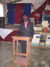 House of Prayer and Freedom Church,Mbeya, Tanzania - Senior Pastor Bishop David Akondowe ministering. in the church.