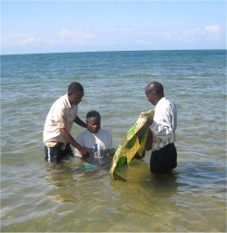 House of Prayer and Freedom Church,Mbeya, Tanzania - Senior Pastor Bishop David Akondowe baptising new members praise God.