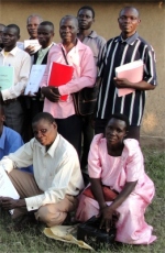 The graduates with their certificates and curriculums