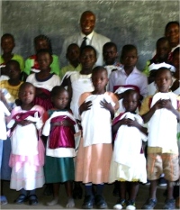 Bishop Pinos visited The King's PowerClub and was able to bless them with white T-shirts and burgundy shorts. 